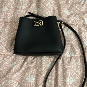 Calvin Klein Black Crossbody Bag with Gold Accents